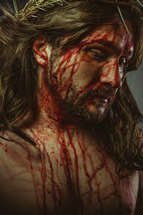 representation of the Calvary of Jesus Christ on the cross. Holy Week in Spain. man with crown of...