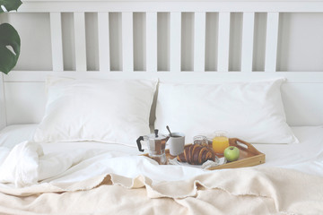 Morning Breakfast in bed. Coffee, croissants, fresh orange juice.
