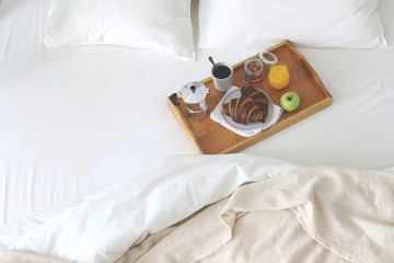 Morning Breakfast in bed. Coffee, croissants, fresh orange juice.