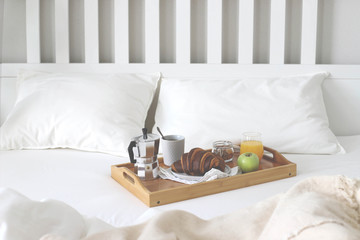 Morning Breakfast in bed. Coffee, croissants, fresh orange juice.