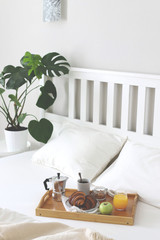 Morning Breakfast in bed. Coffee, croissants, fresh orange juice.