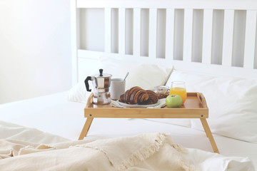 Morning Breakfast in bed. Coffee, croissants, fresh orange juice.
