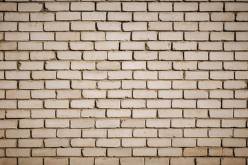 Background of old vintage dirty brick wall with peeling plaster, texture