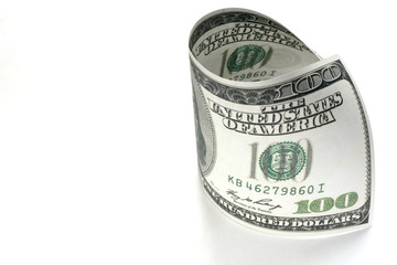 Rolled one hundred dollar money on white background