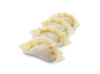 raw dumplings or gyoza isolated on white background