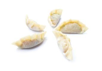 raw dumplings or gyoza isolated on white background