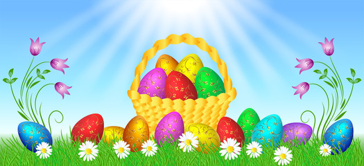 Easter eggs with decorative golden ornament on green grass and basket against sun rays