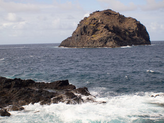 waves crashing on rocks
