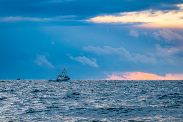 Lobster fishing boat scenery of Canada's Atlantic coast with a beautiful sky.