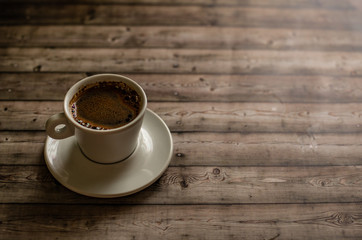 White coffee Cup on wood natural background
