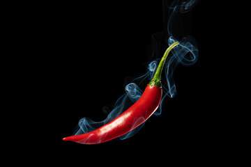 Smoking Chili on black background. Photo was made in Studio
