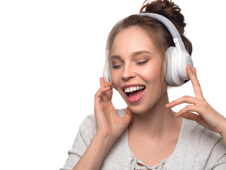 Fototapeta premium attractive girl with headphones on white background