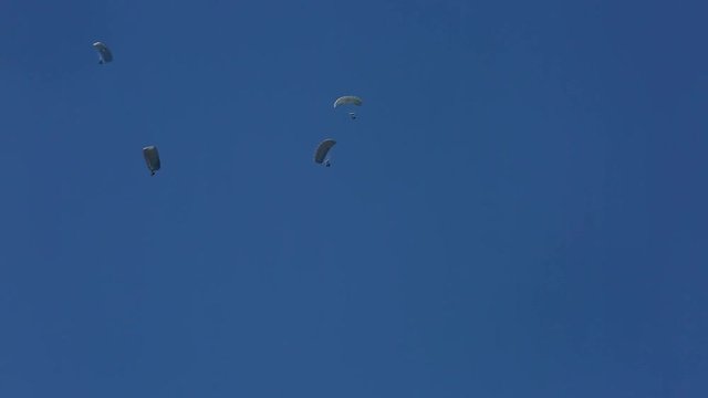 Soldiers gliding in formation in the sky 1