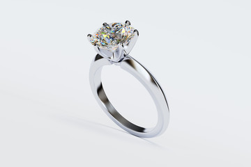 Solitaire diamond engagement ring on white background