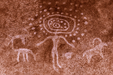 The image of an ancient man on the wall of the cave. ancient art, history, archaeology.
