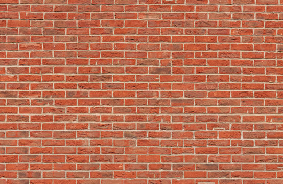 Fototapeta Old brick wall with red cracked bricks.Texture.Background.