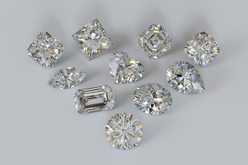 Ten variously cut diamonds on light gray background.