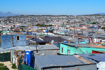 Khayelitsha township, South Africa - 29 August 2018 : BAckyard in a township in South Africa - obrazy, fototapety, plakaty