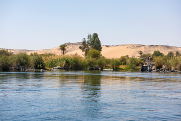 View of river nile in Aswan Egypt showing cataracts and mountain