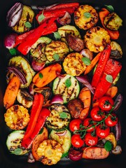 Grilled vegetables in a cast iron pan.