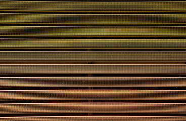 Fototapeta premium Metal grating with rubber textured multi-colored coating.Texture