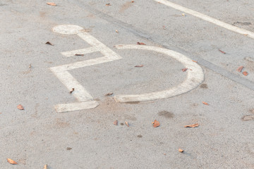disable people sign at parking lot in Thailand