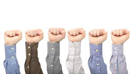 Fototapeta premium Male hands in fists in different shirts on white background