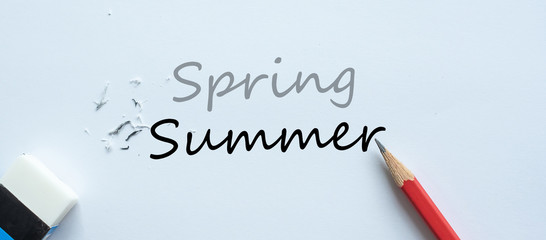 erasing Spring text change to Summer. Season change concept