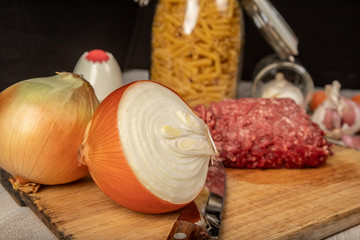 still life of minced meat, preparation of macaroni bolognese