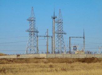Outdoor Electrical Substation High Voltage. Transformer substation high voltage electrical network. Industrial energy. The outskirts of the city of Ust-Kamenogorsk (Kazakhstan). Urban and nature