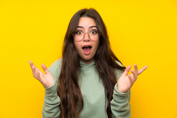 Teenager girl with sweatshirt with surprise facial expression