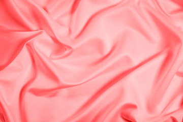 Obraz premium Closeup of rippled coral satin fabric