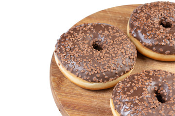 Donut With Chocolate Topping Cream On The Wooden Board