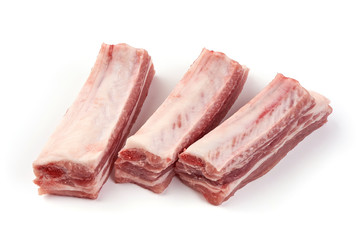 Raw meat ribs, close-up, isolated on white background