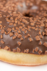 Closeup Of Donut With Chocolate Topping Cream