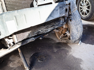 broken radiator of crashed car close up