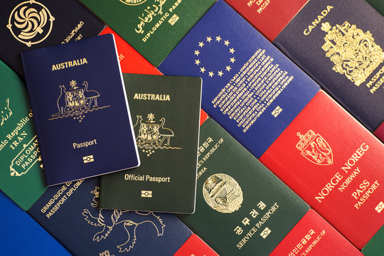 Passport and official passport of Australia against the background of various documents of many countries of the world