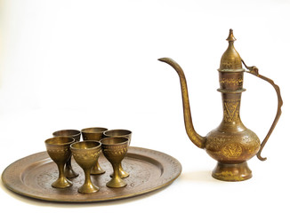 Fototapeta na wymiar middle eastern tea set with mini goblets