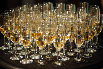 Beautiful glasses with wine champagne drinking at wedding, event, party, birthday, and important moments