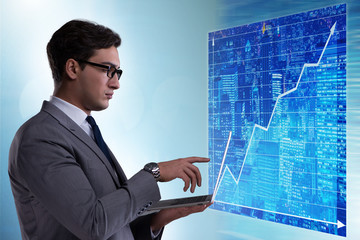 Businessman in futuristic stock trading concept