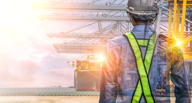 The double exposure image of the engineer standing back during sunrise overlay with Container Cargo ship and Cargo plane with working crane bridge in shipyard