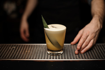 Close-up of alcohol cocktail on a bar counter