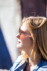 beautiful girl with glasses on a bright Sunny day - 263292071