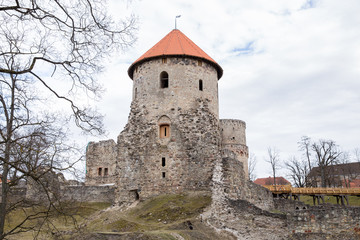 Old castle and rocks in spring. Nature and historic building. Travel photo 2019.