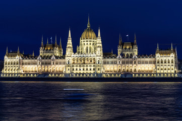 Fototapeta na wymiar View of Budapest Parliament at dusk with its roofs at blue hour, Hungary