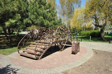 Bridge of lovers in the city park. place for wedding ceremonies