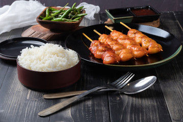 grilled chicken butt skewer and steamed rice