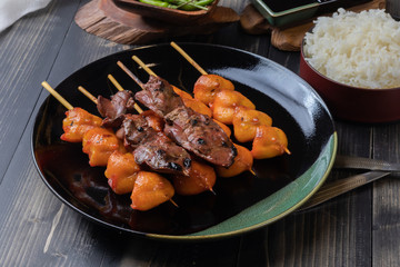 grilled chicken butt skewer and Grilled liver skewer