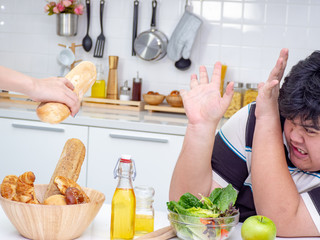 Asian fat man reject unhealthy food from another people