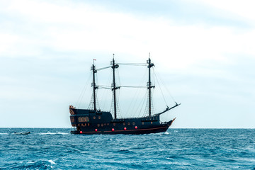 Fototapeta na wymiar one big beautiful ship on the blue sea. Horizontal frame